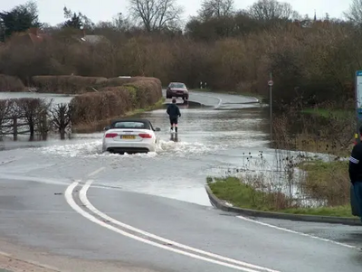 Floooding in Eton Road Datchet in 2014 - The Royal Borough is in the front line of Climate Change