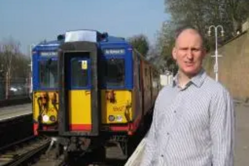 Julian Tisi inspects the Current Trains